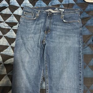 Selling a dark blue jeans never worn size 38x32